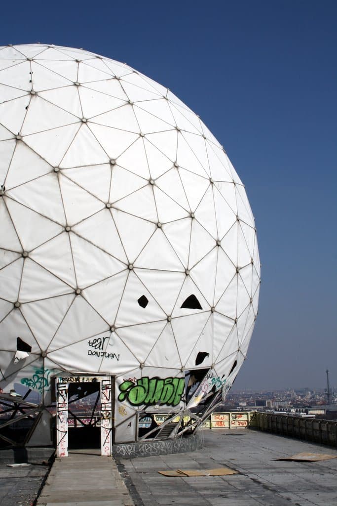 Geodesic radar dome on Teufelsberg against a blue sky