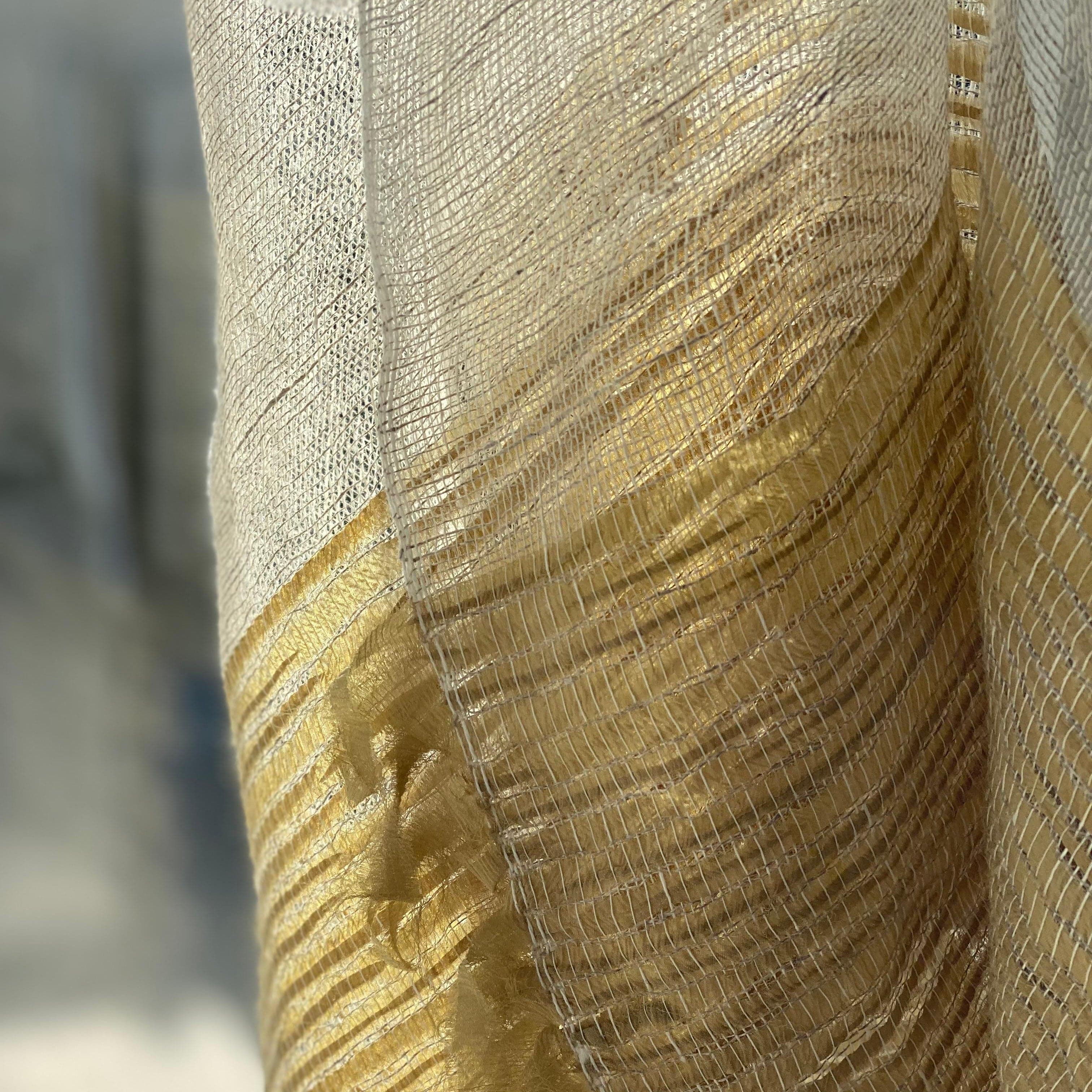 Natural linen with a woven gold stripe